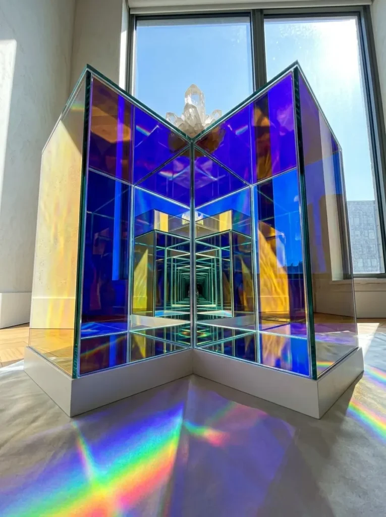 Iridescent Glass Cube Table Square glass side table displaying vibrant blue and purple iridescent colors and rainbow reflections