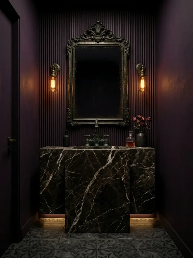 Dark Plum Moody Bathroom Rich dark plum bathroom with marble sink and vintage sconces