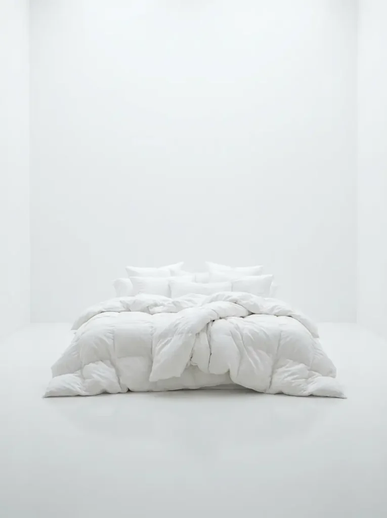 All white bedroom with fluffy duvet