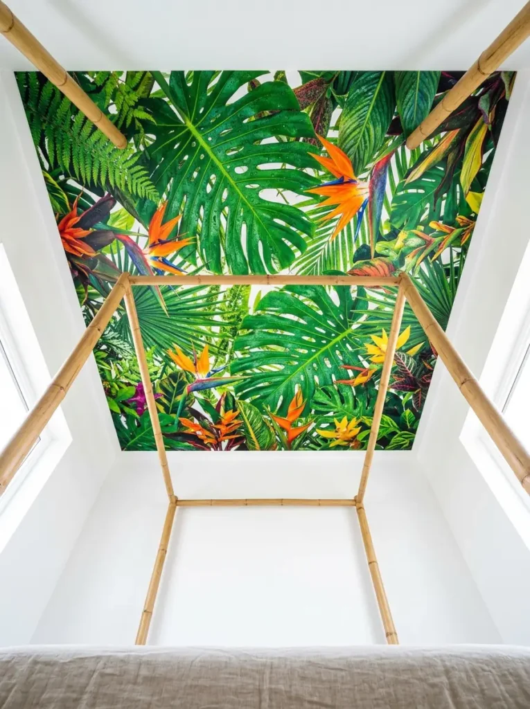 Tropical botanical mural on bedroom ceiling